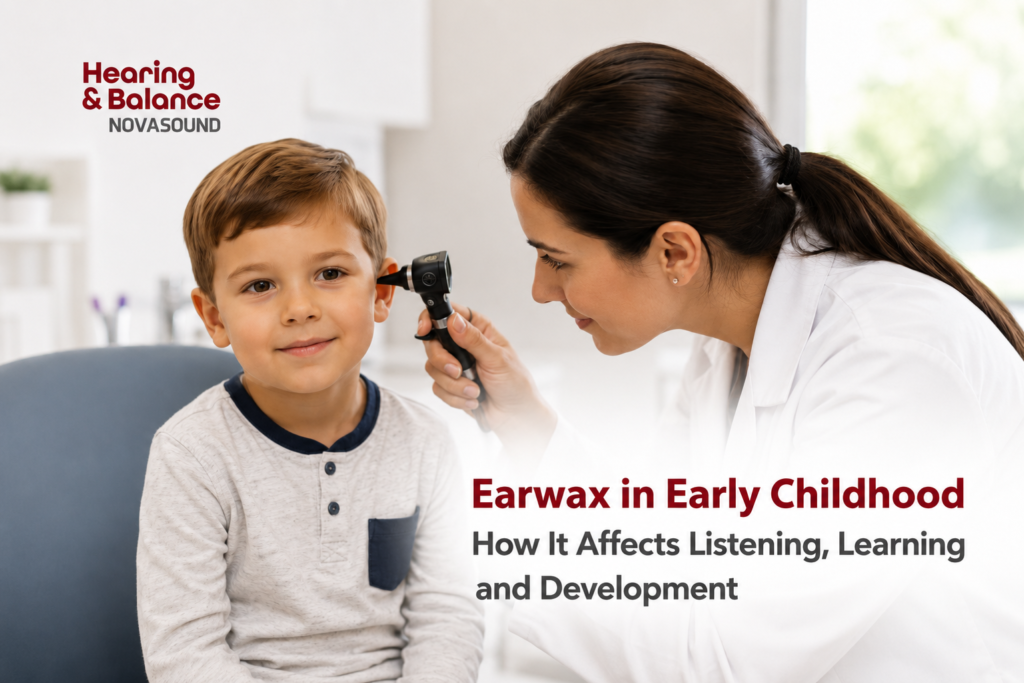 Child having ear examination for earwax buildup by audiologist